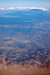 Aerial view of Humphreys Peak in cloud with Verde River at Perkinsville from Chino Valley Arizona United States