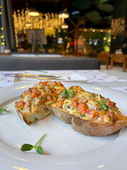 bruschetta with tomatoes and hot cheese