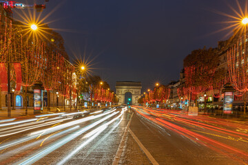 Paris,France - 12 09 2020: View of the Arc-De-Triomphe and Avenue des Champs Elysées with Christmas lights