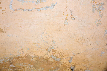 Texture of the old wall with peeling paint, plaster with cracks. Texture backround.