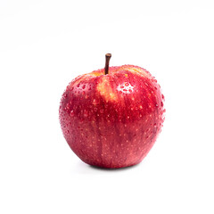 Red Apple with water drops isolated on a white background.