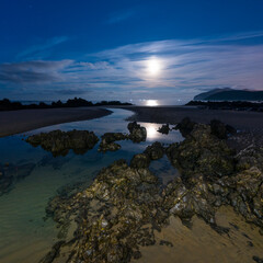 The Moon in Trengandin beach, Noja, Marismas de Santoña, Noja y Joyel Natural Park, Cantabrian Sea, Cantabria, Spain, Europe