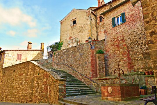 landscape of the medieval village of Lucignano in the province of Arezzo in Tuscany, Italy. It is a small town of ancient origins enclosed by walls overlooking the Valdichiana