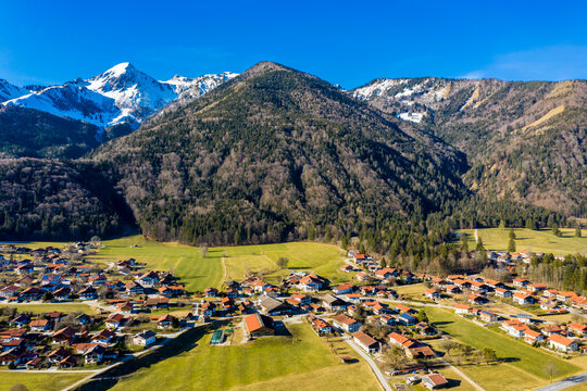 Germany, Bavaria, Schleching, Helicopter view of alpine town in summer