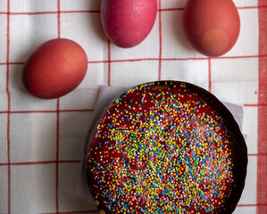 Easter. Easter cake with sweet red fondant and Easter eggs. Easter atmosphere
