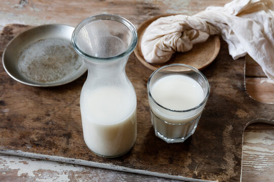Carafe and glass of homemade rice milk