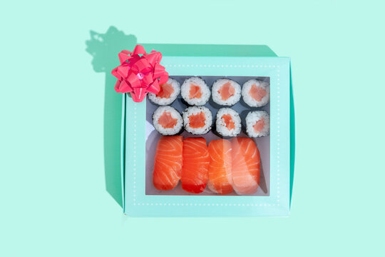 Studio shot of gift box with maki sushi and nigiri