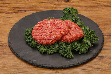 Raw beef burger cutlet for cooking