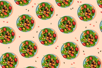 Pattern of plates of fresh ready-to-eat vegan salad