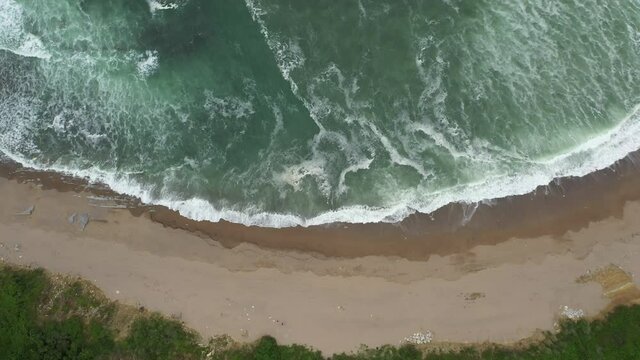 Top shot of ocean coast in the south west of France during a cloudy day with wind.