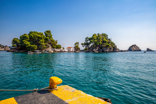 Greece, Preveza, Parga, Marina bollard with&Ocirc;&oslash;&Omega;Panagia&Ocirc;&oslash;&Omega;Chapel in background