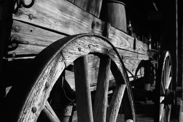 Obraz premium antique wooden cart, wooden wheel, vintage, black and white