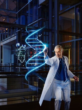 Male doctor light painting DNA in laboratory at hospital