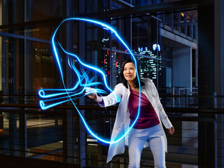 Female internist analyzing spleen in laboratory at hospital