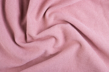 Twisted pink cotton material texture for the background