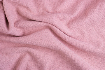 Twisted pink cotton material texture for the background