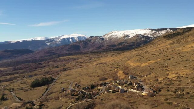 Aerial view, flying across the valley in Font Romeu. Beautiful landscape in the french Pyrenees-Orientales, in south of france.