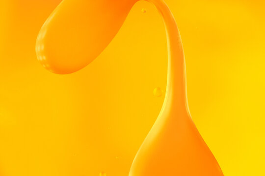 Drop of honey, abstract background.