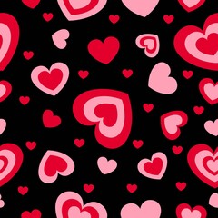 St Valentine’s Day. Seamless pattern with red and pink hearts. Black background. Decorative ornament. Love and romance. Template for post cards, wallpaper, textile, scrapbooking and wrapping paper