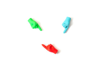 Multi-colored palms with a pointing finger on a white background. Isolated.