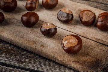 Chestnuts on an old wooden table