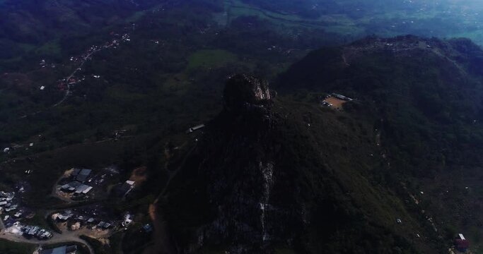 a hill of rock in west of java by drone 4K half circle
