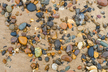 A close up of beach pebble stones