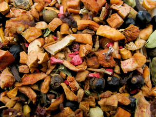 A warming drink made from berries and fruits for brewing. Cardamom, mint, clove, raspberry, juniper, allspice, Apple, cinnamon, rosehip.