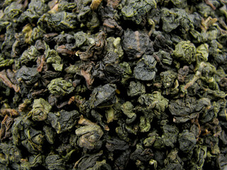 Fototapeta na wymiar The leaves of green tea milk Oolong. Wu long