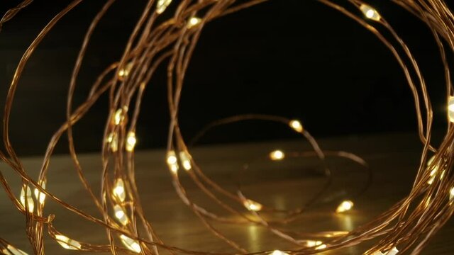 Led fairy lights with probe lens moving through the coil tunnel