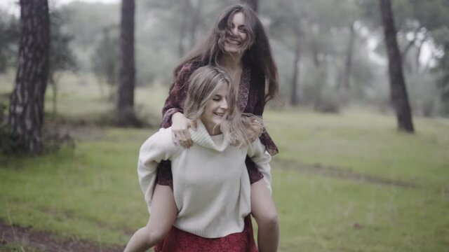 Being a kid with female bff spinning in circles in slow motion