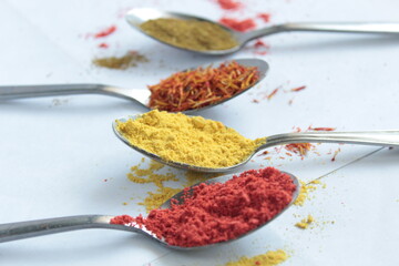 spices in spoons