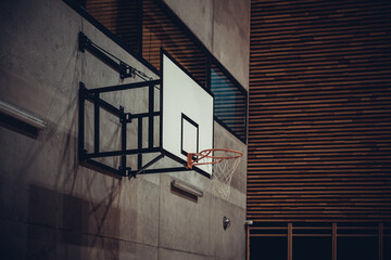 basketball hoop in a modern school gym