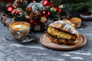 New Year's breakfast with croissants. New Year's croissant with chocolate and baked banana