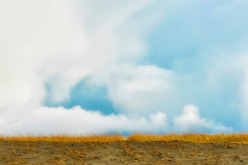 Clouds over coastal dunes