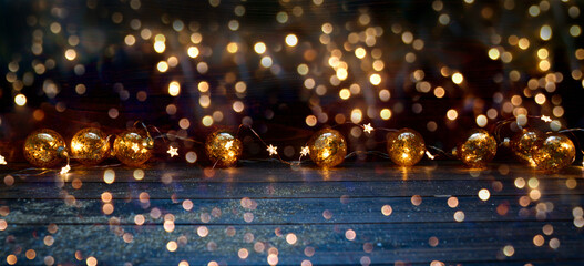 Christmas background - golden fairy lights, rustic Christmas decoration