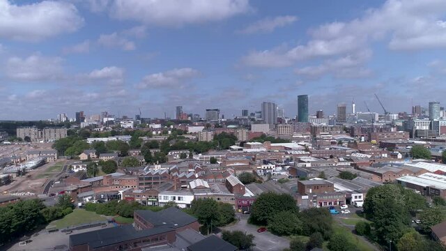 Aerial track in shot above Birmingham city centre