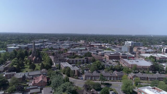 Right to Left aerial shot above park in Solihull, Birmingham, UK