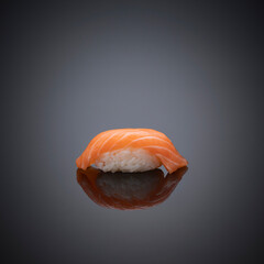 Japanese sushi on a gray-black background.
