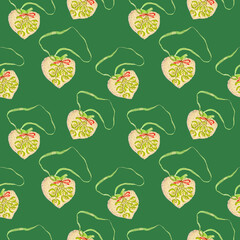 seamless christmas pattern from soft Christmas tree decoration embroidered in the shape of a heart isolated on light green, Print for paper, fabric, wallpaper