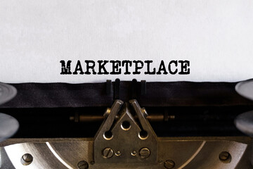 Vintage typewriter with typed text - MARKETPLACE, on a sheet of paper