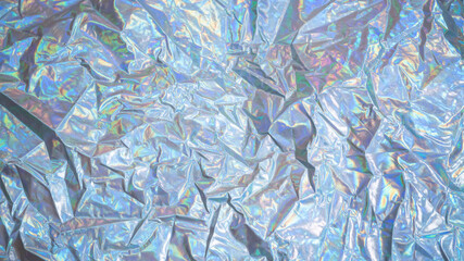 Holographic iridescent surface wrinkled foil pastel Sparkling colored fabric holographic background. 