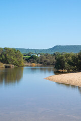 Vertical image of little beach lake in the Atlantic coast of Spain