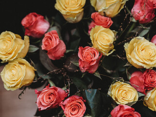 Bunch of yellow and pink roses