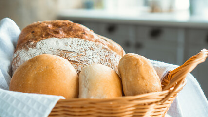 A basket containing fresh crisp bread.