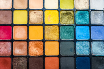 Palette of multicolored eyeshadows, close-up