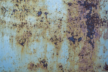 Old cracked paint on rusty iron. background texture