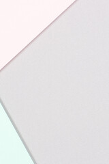 Abstract colored paper background. Minimal geometric shapes and lines in pastel pink, light green and gray colours