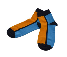 pair of multicolored socks laid out and isolated on white background