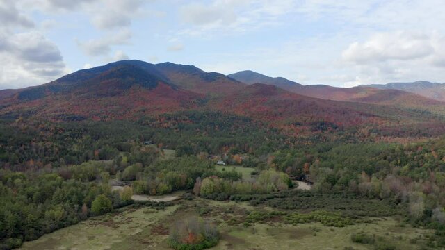 Wide Aerial View of a Vast Forest in Keene Valley in the Adirondack Mountains During The Fall Time